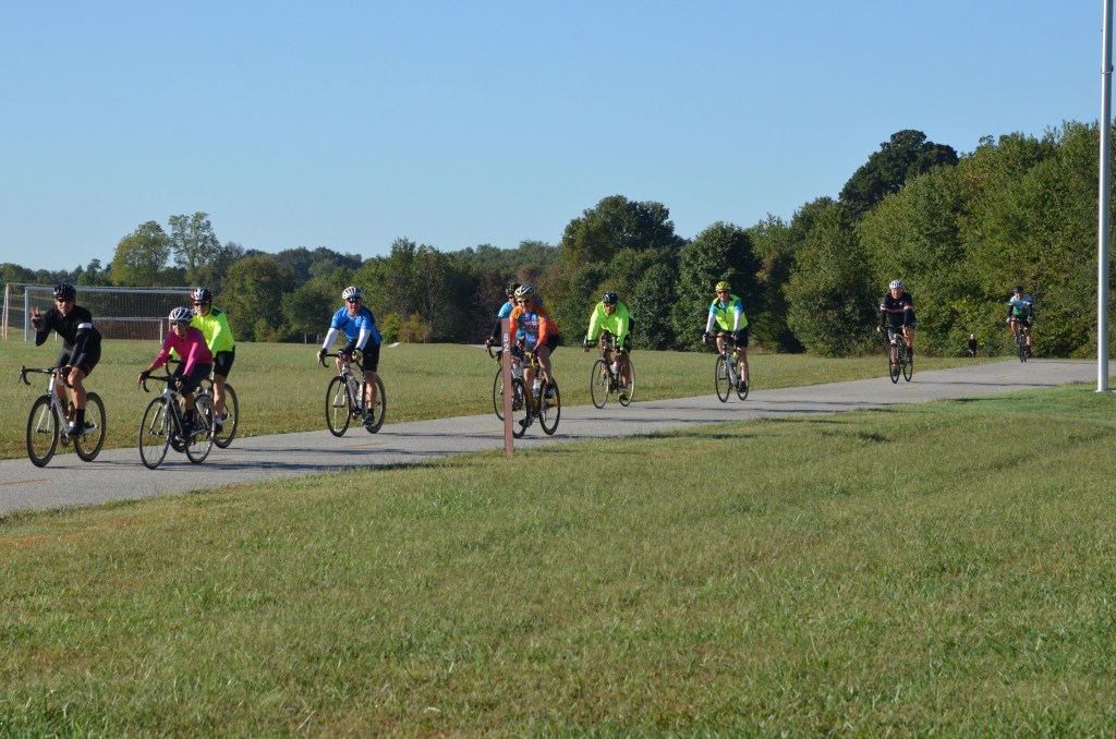 Cyclists on the Legacy Trail through the former McGrathiana grounds